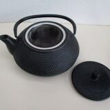 Black cast iron teapot