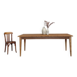 Vintage farm table with spindle legs.