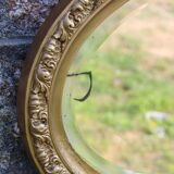 Bevelled oval antique mirror