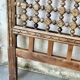 Carved wooden headboard