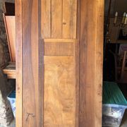 Art Deco wardrobe in carved solid oak with bevelled mirror, 1930.