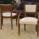 Pair of bridge armchairs in walnut and cream boucle fabric, early 20th century.