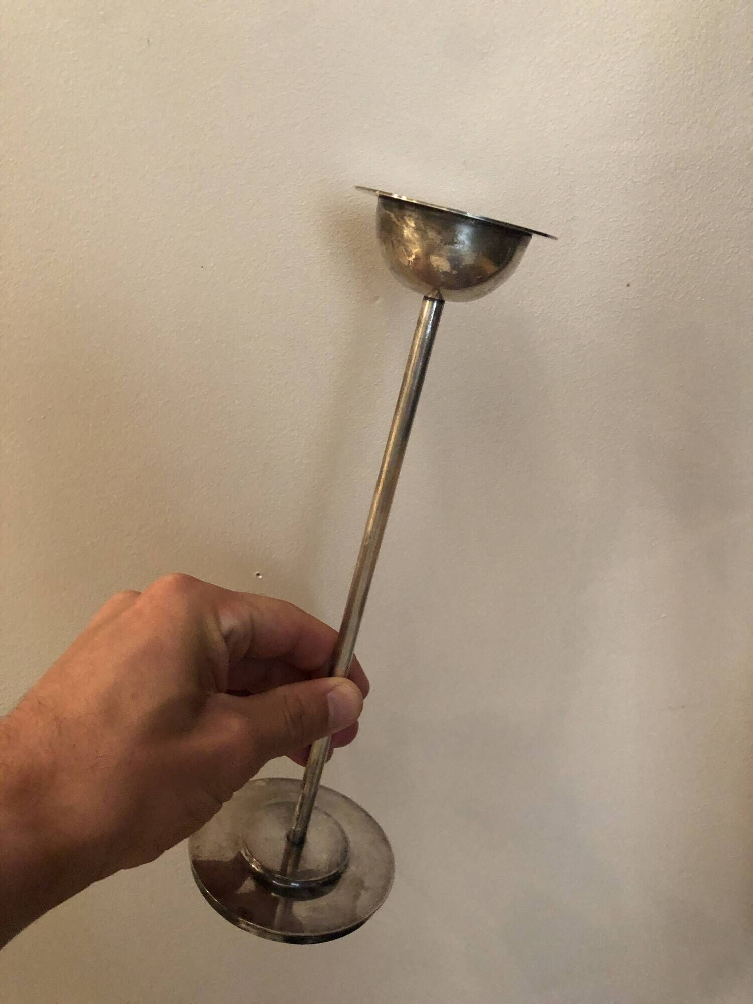 Silver-plated metal candlestick in vintage Art Deco style