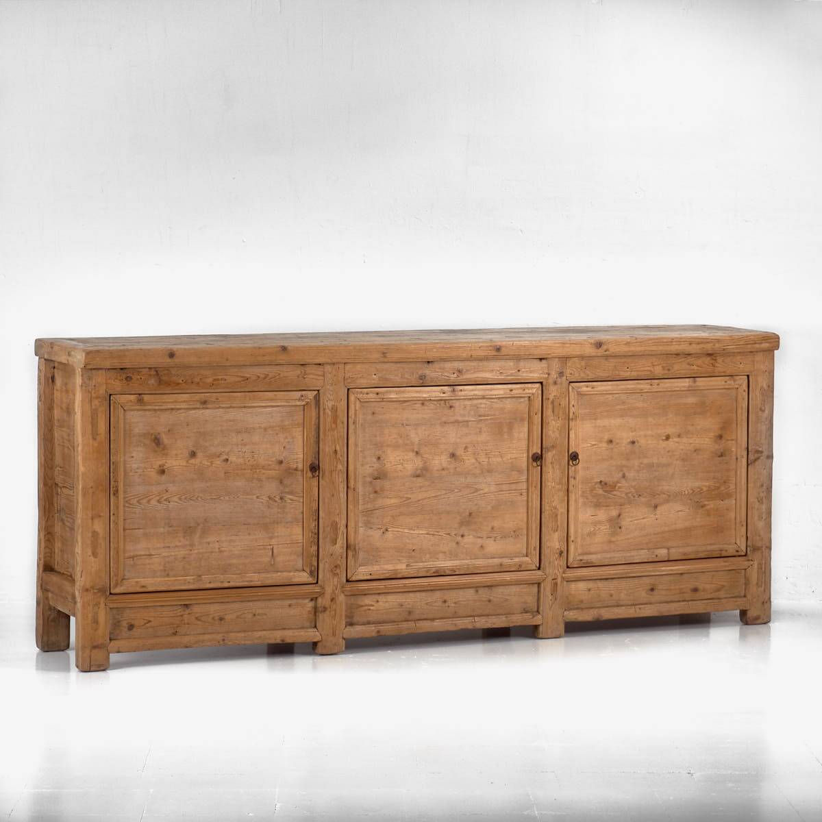 Antique wooden three-door sideboard (circa 1920)