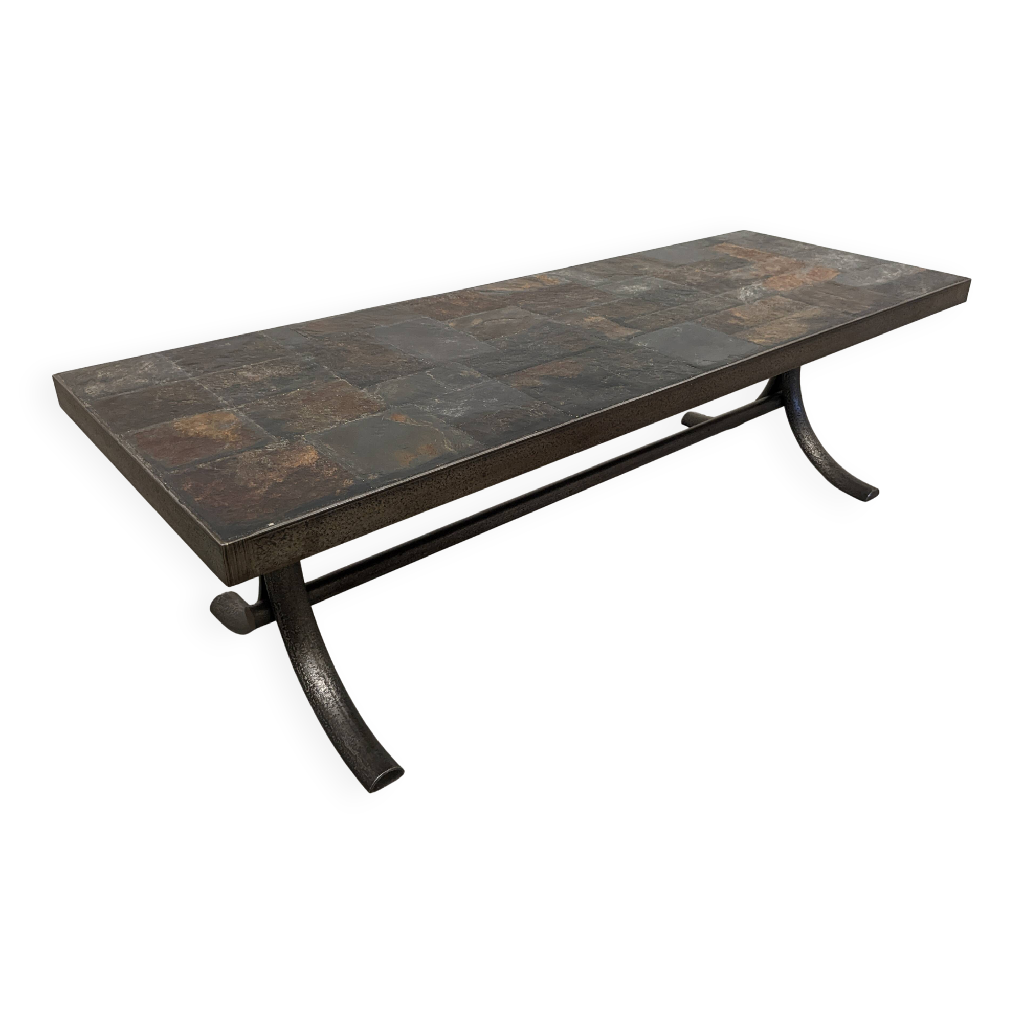Brutalist coffee table in natural stone and wrought iron, France circa 1960.