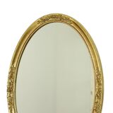 Miroir ovale doré Deknudt style Hollywood Regency