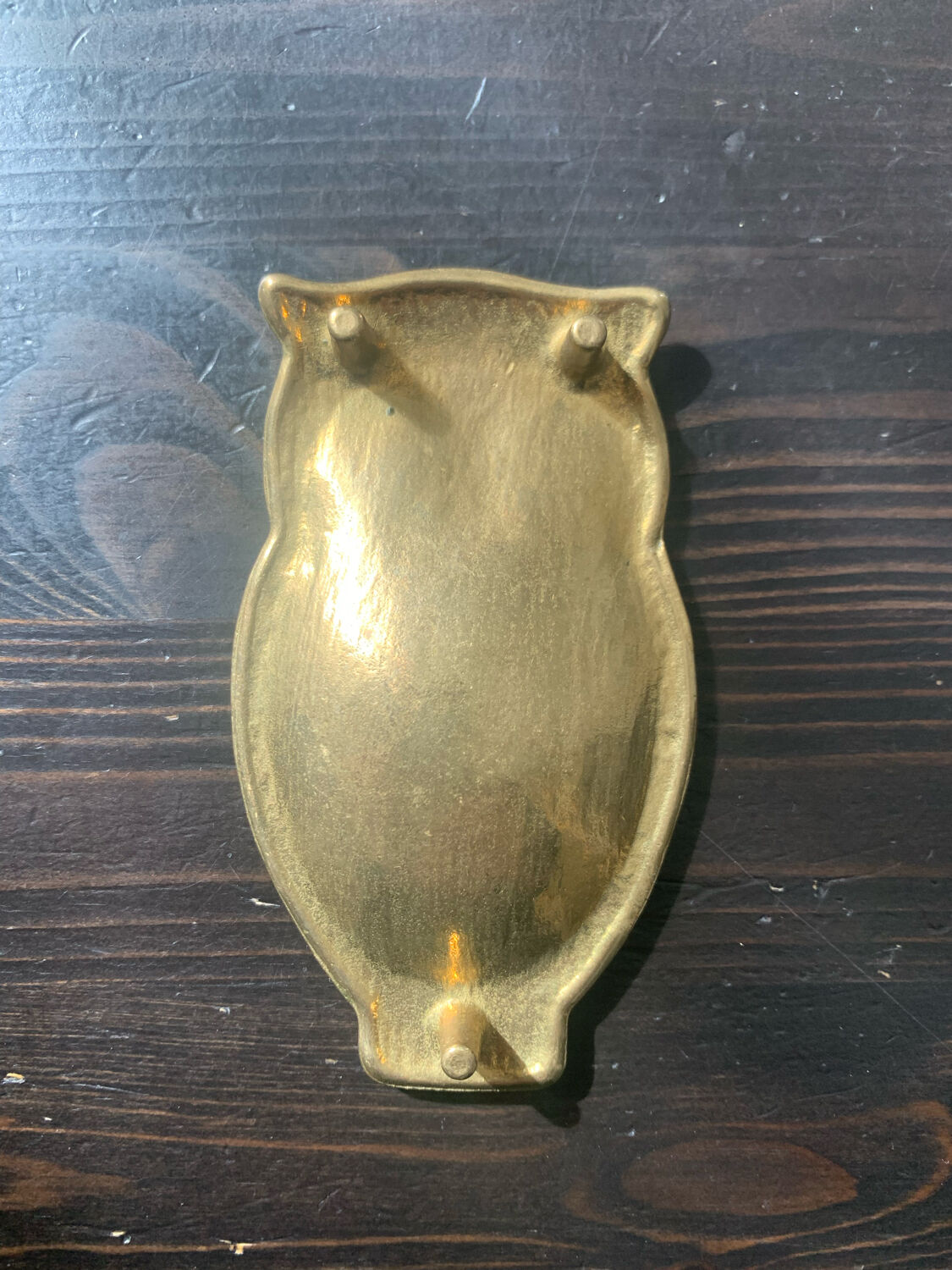 Empty brass pocket owl