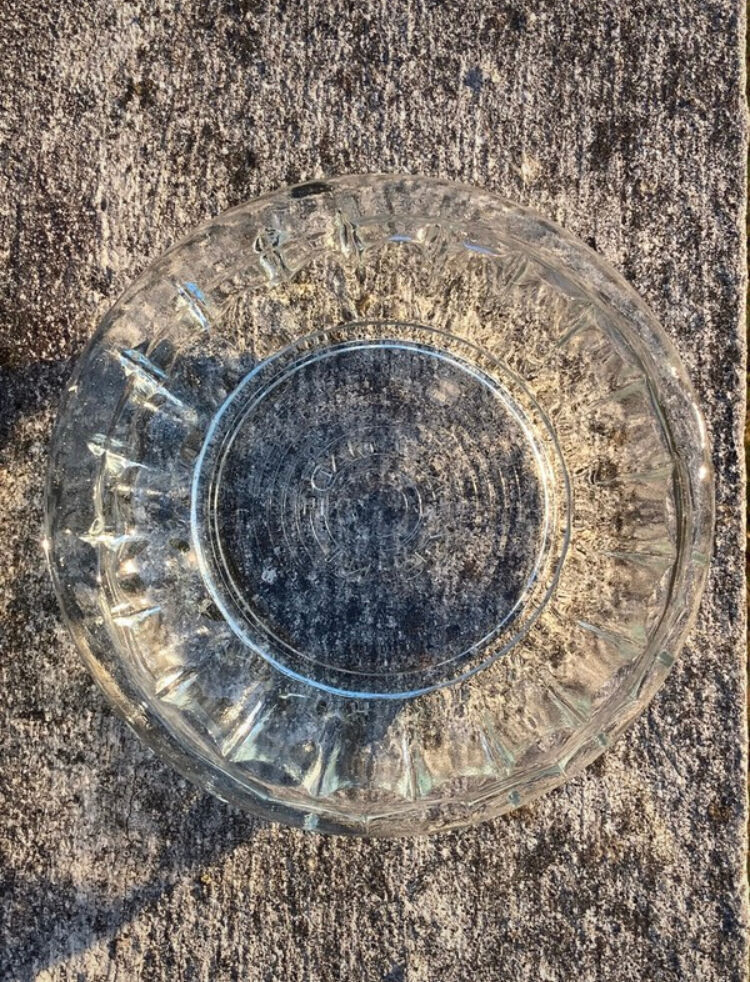 Empty round molded glass pocket