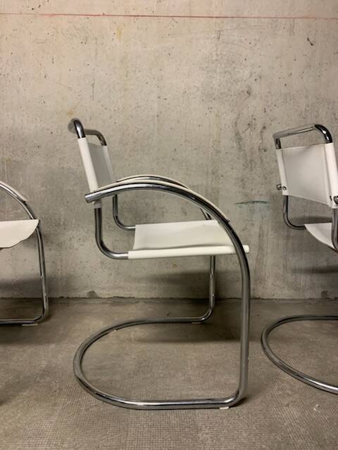 Lot of three vintage tubular armchairs from the 70's