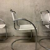 Lot of three vintage tubular armchairs from the 70's
