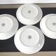 Set of small plates, vintage saucers in porcelain.