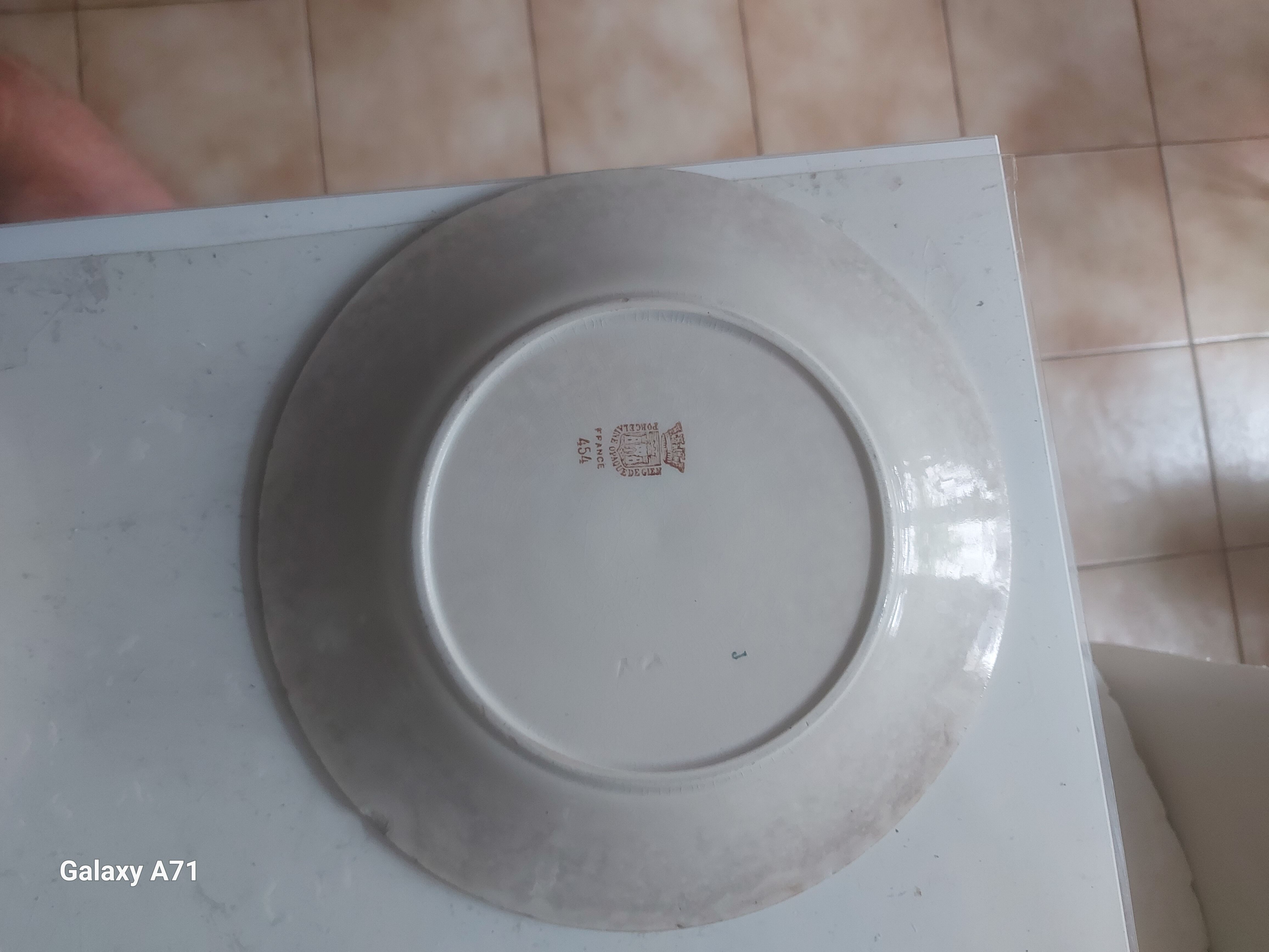 2 antique plates in opaque porcelain from Gien