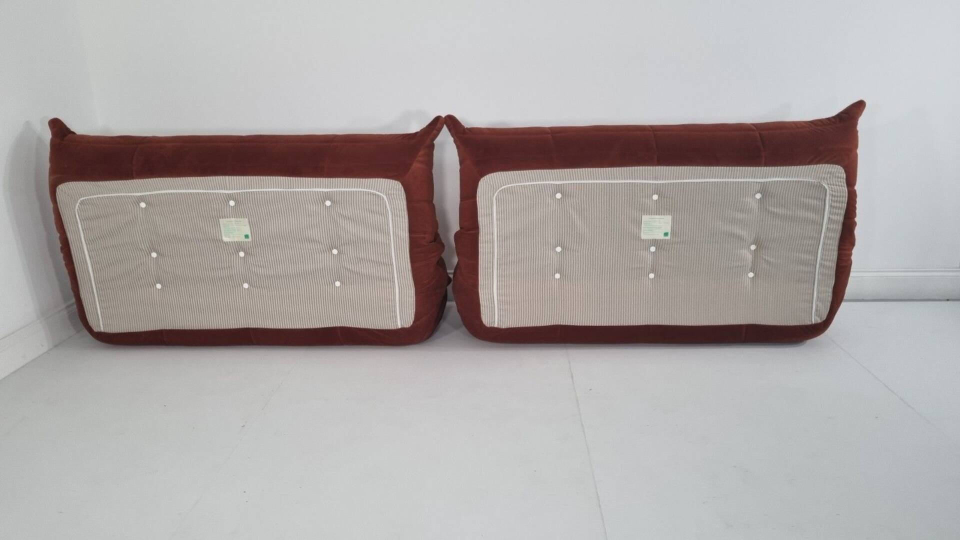 Ligne Roset Pair of 3-seater Togo sofas in rust velvet