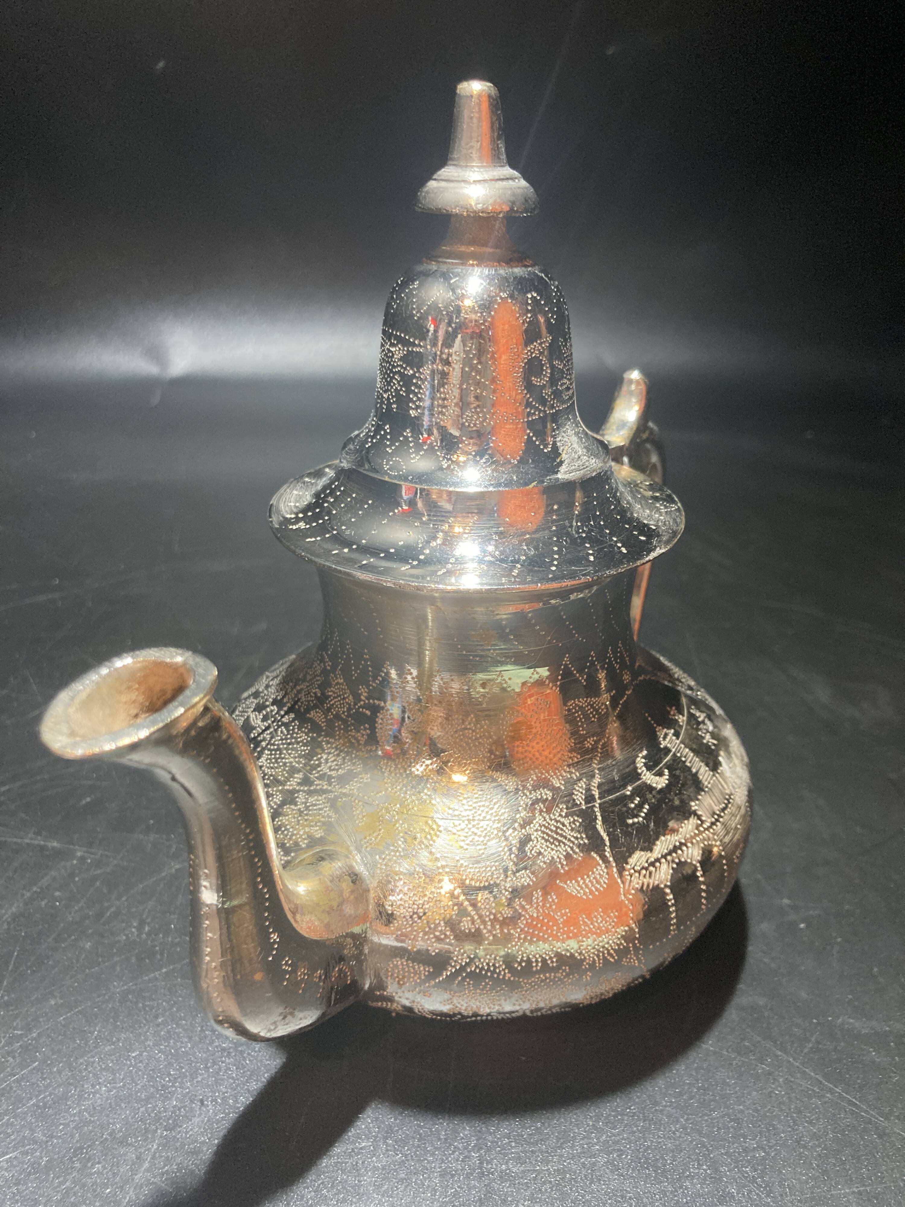 Silver metal teapot