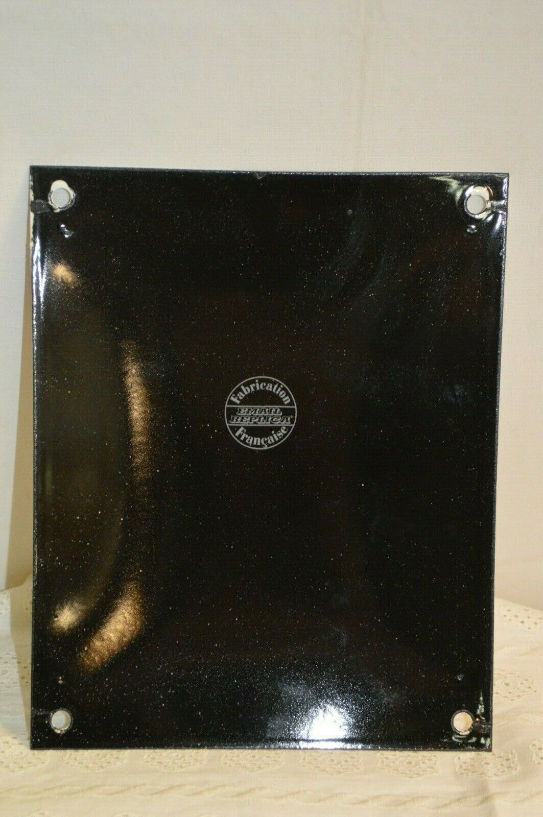 Enamel plate license IV