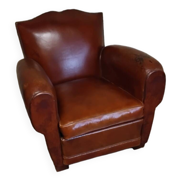 Club chair with a moustache backrest