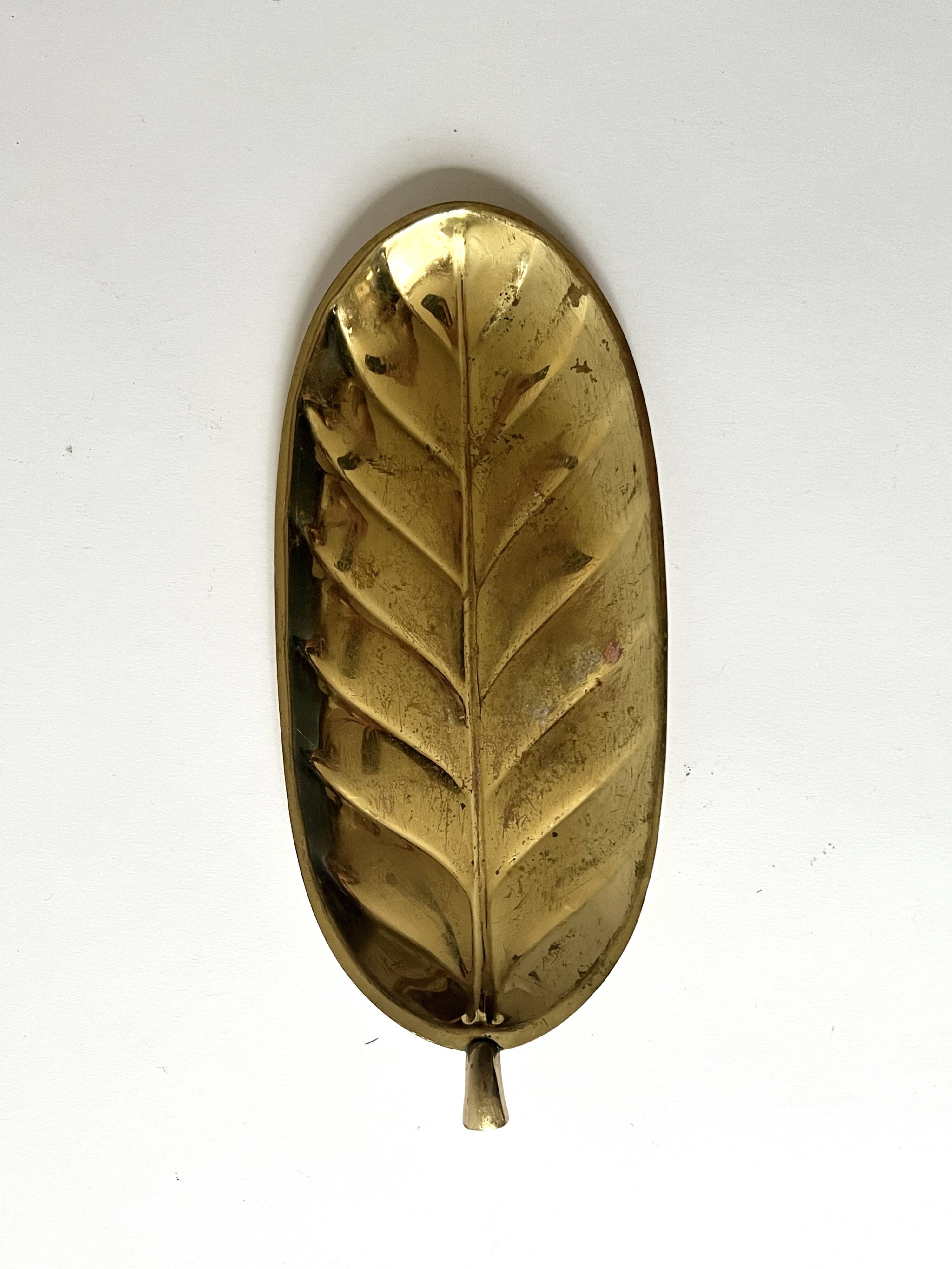Brass leaf-shaped catchall, signed Christofle.