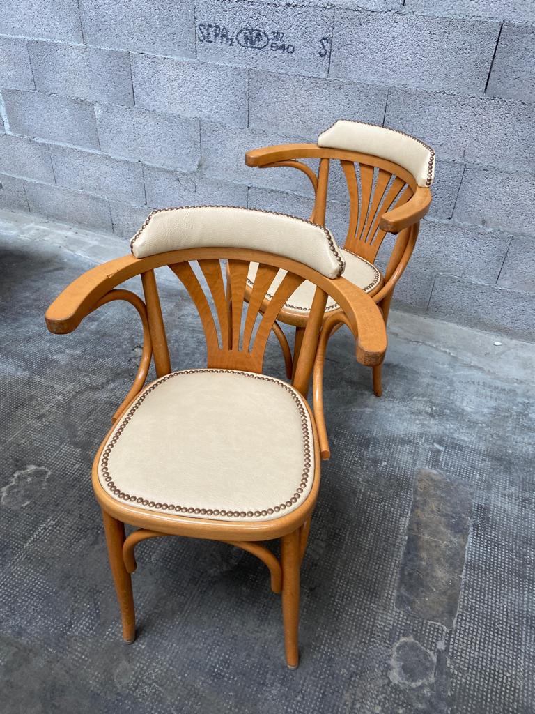 Pair of vintage curved wood restaurant armchairs