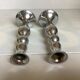 Pair of silver metal candlesticks