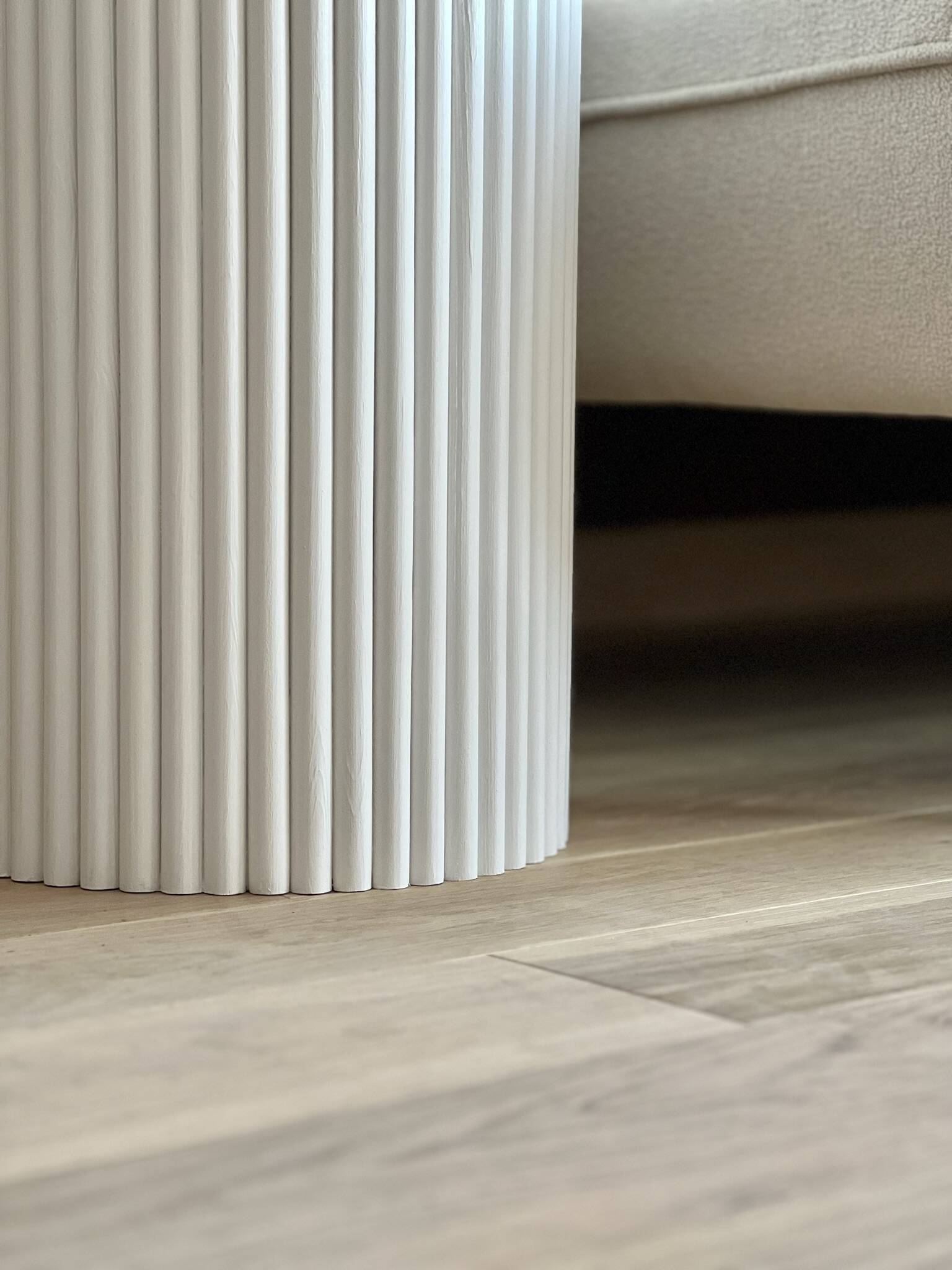 round and fluted bedside table in white