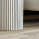 round and fluted bedside table in white