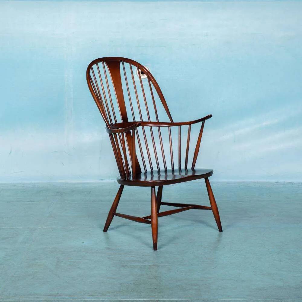Ercol model 472 fireplace chair from the 1960s in beech.