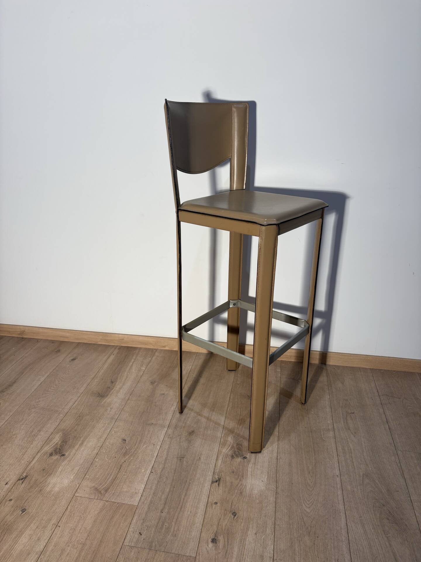 Pair of leather stools Enrico Pellizoni
