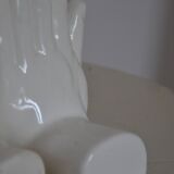 Handends in the shape of vintage white ceramic