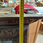 Large bevelled mirror with a carved wooden frame