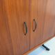 Vintage modular secretary bookshelf in teak and metal.