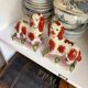 Pair of Staffordshire porcelain Cavalier King Charles dogs on terrace, 19th century.
