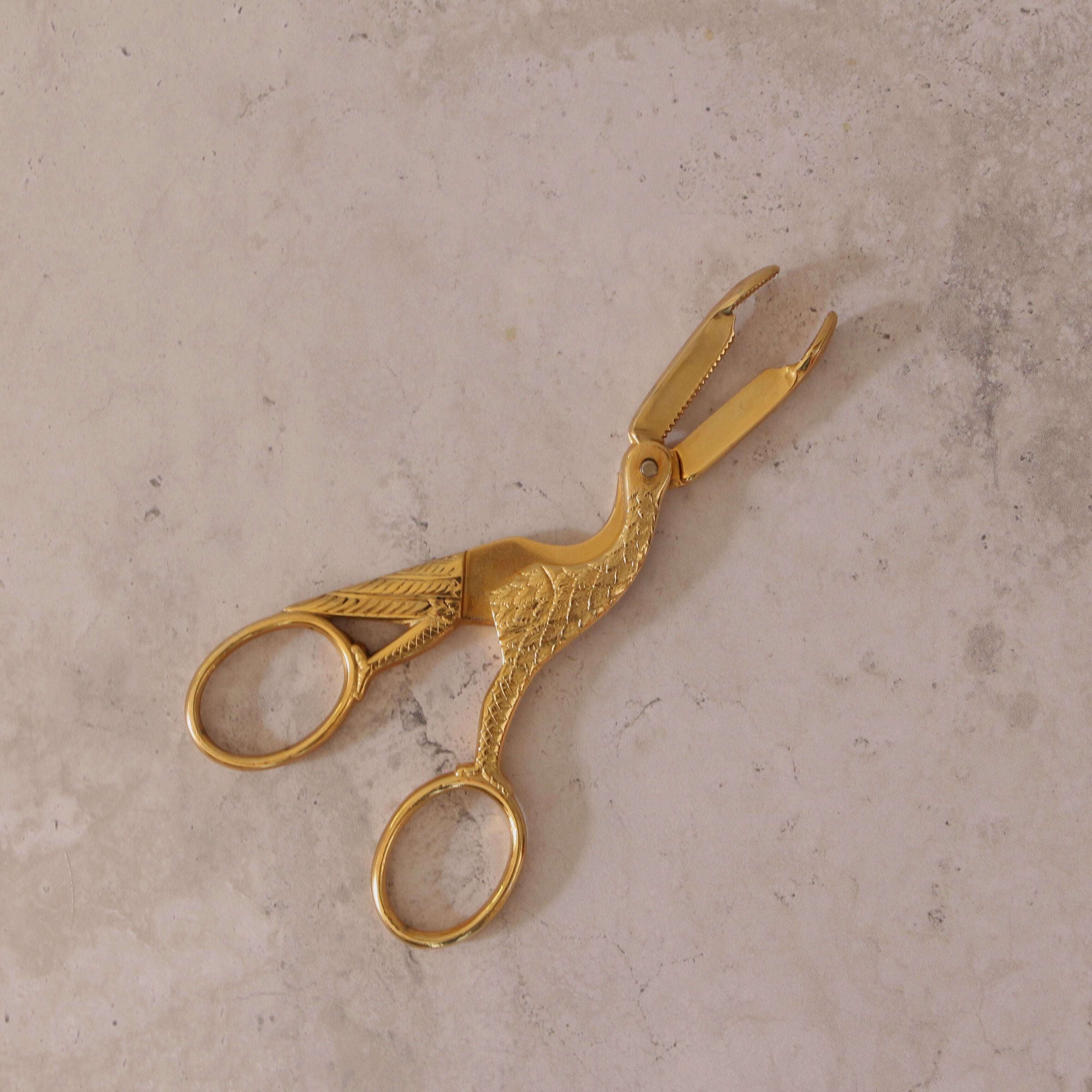 Golden bird sugar tongs