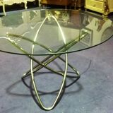Round table in chrome and glass
