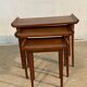 Set of three nesting low tables in a Japanese style, made of mahogany.