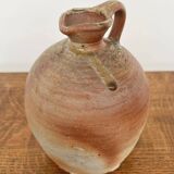 Small antique stoneware jar with handle