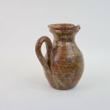 Brown speckled stoneware pitcher in very good condition