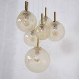 “Cascade” brass chandelier with amber globes