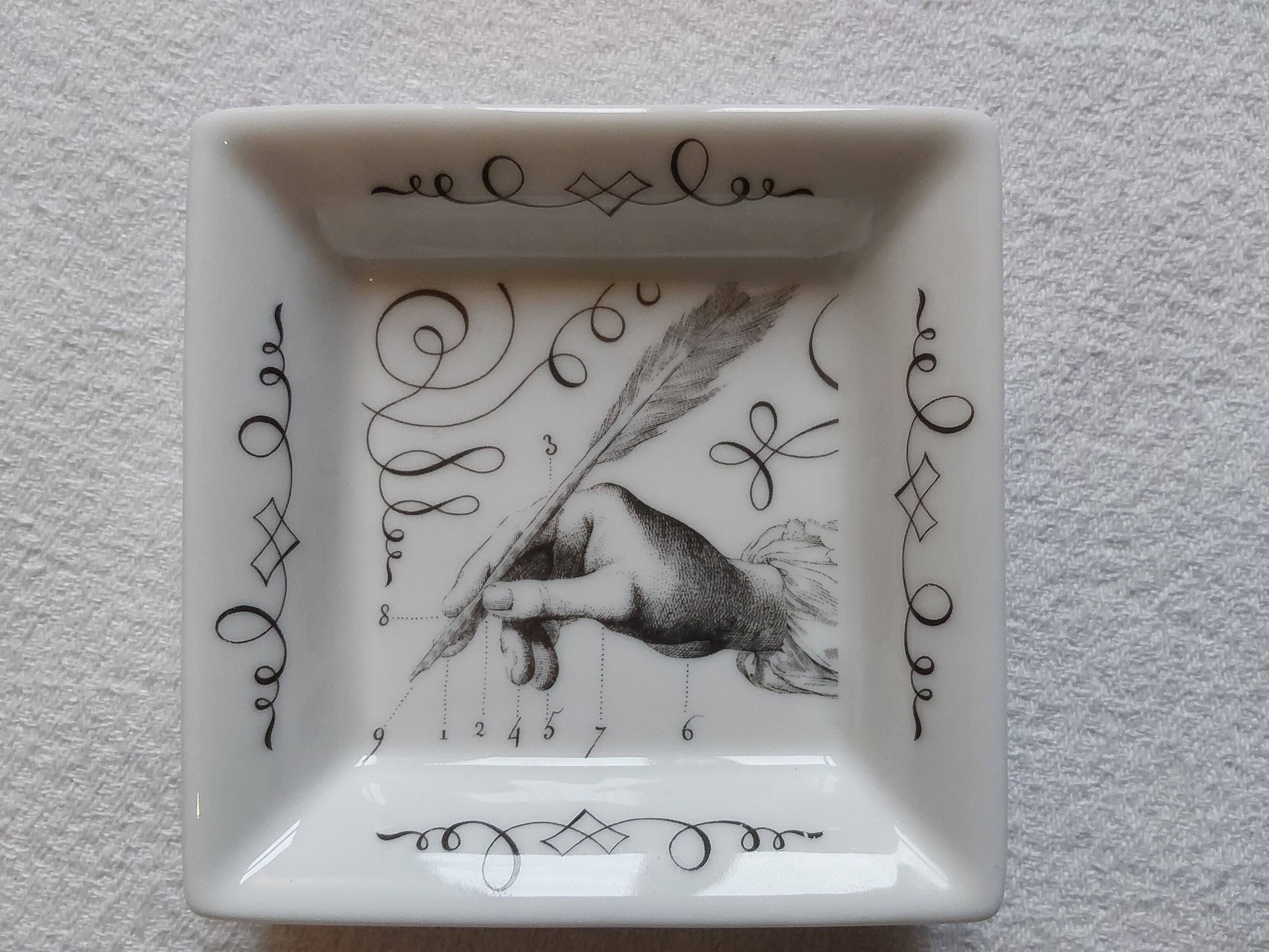 Mini Hermès pocket emptier