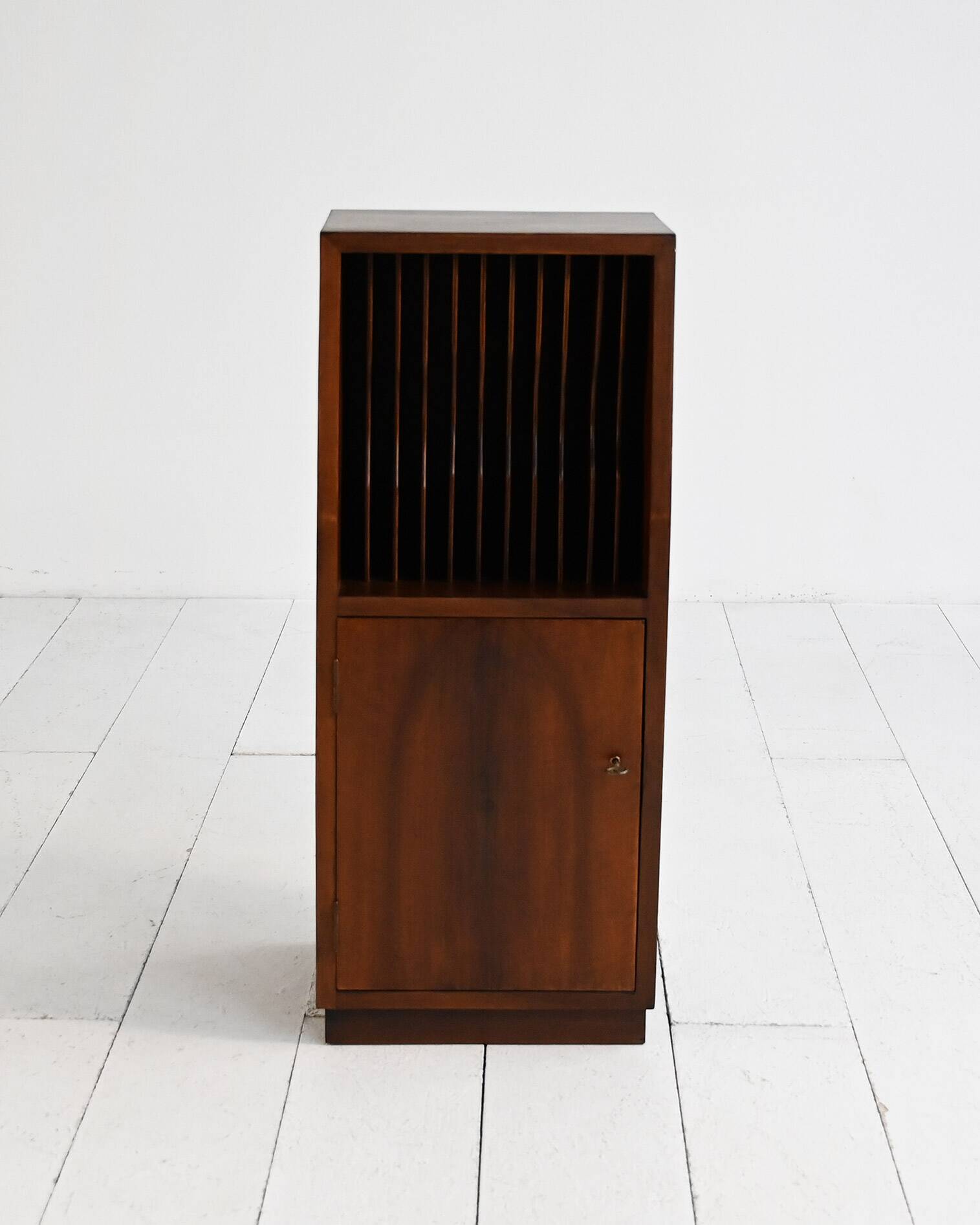 Cabinet with vinyl storage compartment