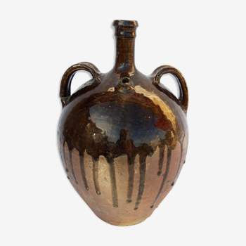 Old glazed earth jug