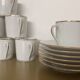 Coffee service with 11 cups and 6 saucers made of Limoges porcelain.