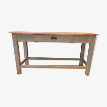 Patinated drapery table