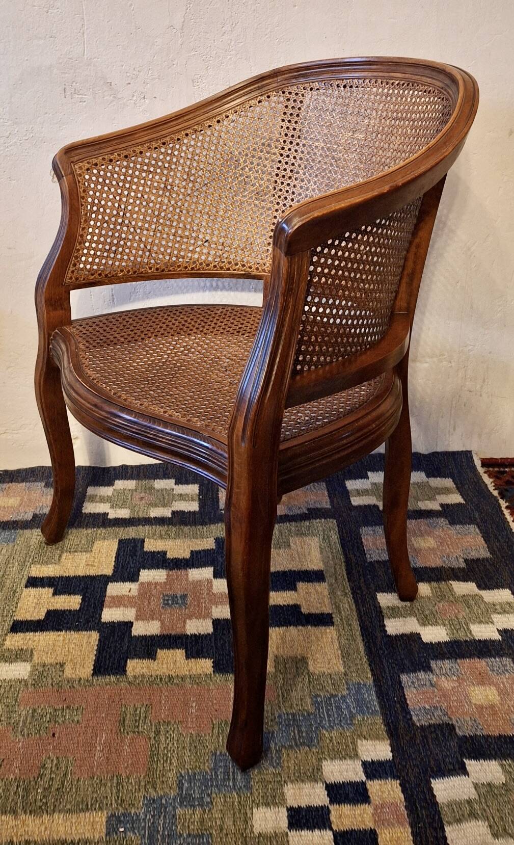 Half-moon rattan and hardwood armchair, early 20th century