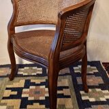 Half-moon rattan and hardwood armchair, early 20th century