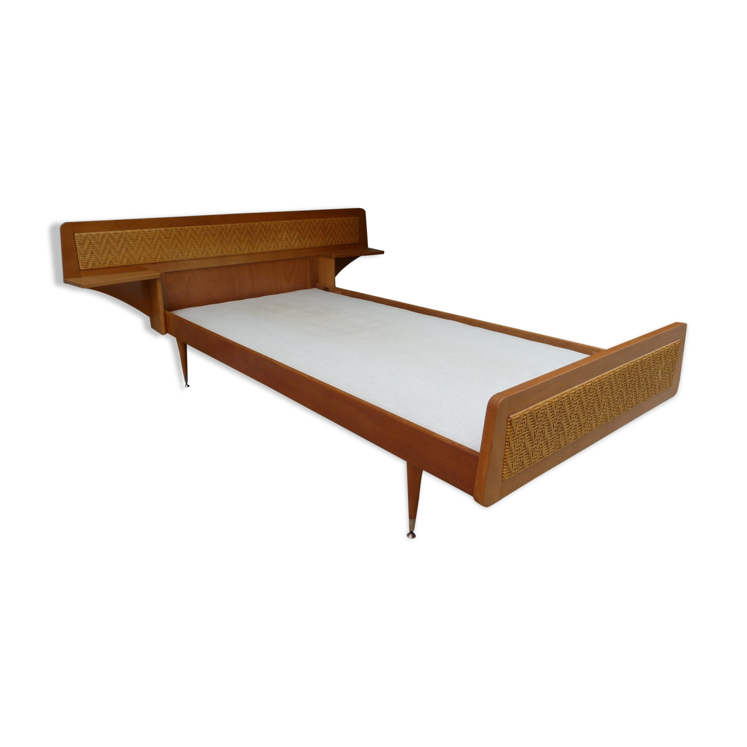 Wooden bed and rattan