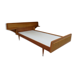 Wooden bed and rattan