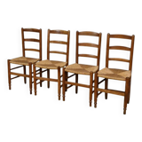 Set of 4 rush-seated chairs in cherry wood – late 19th century