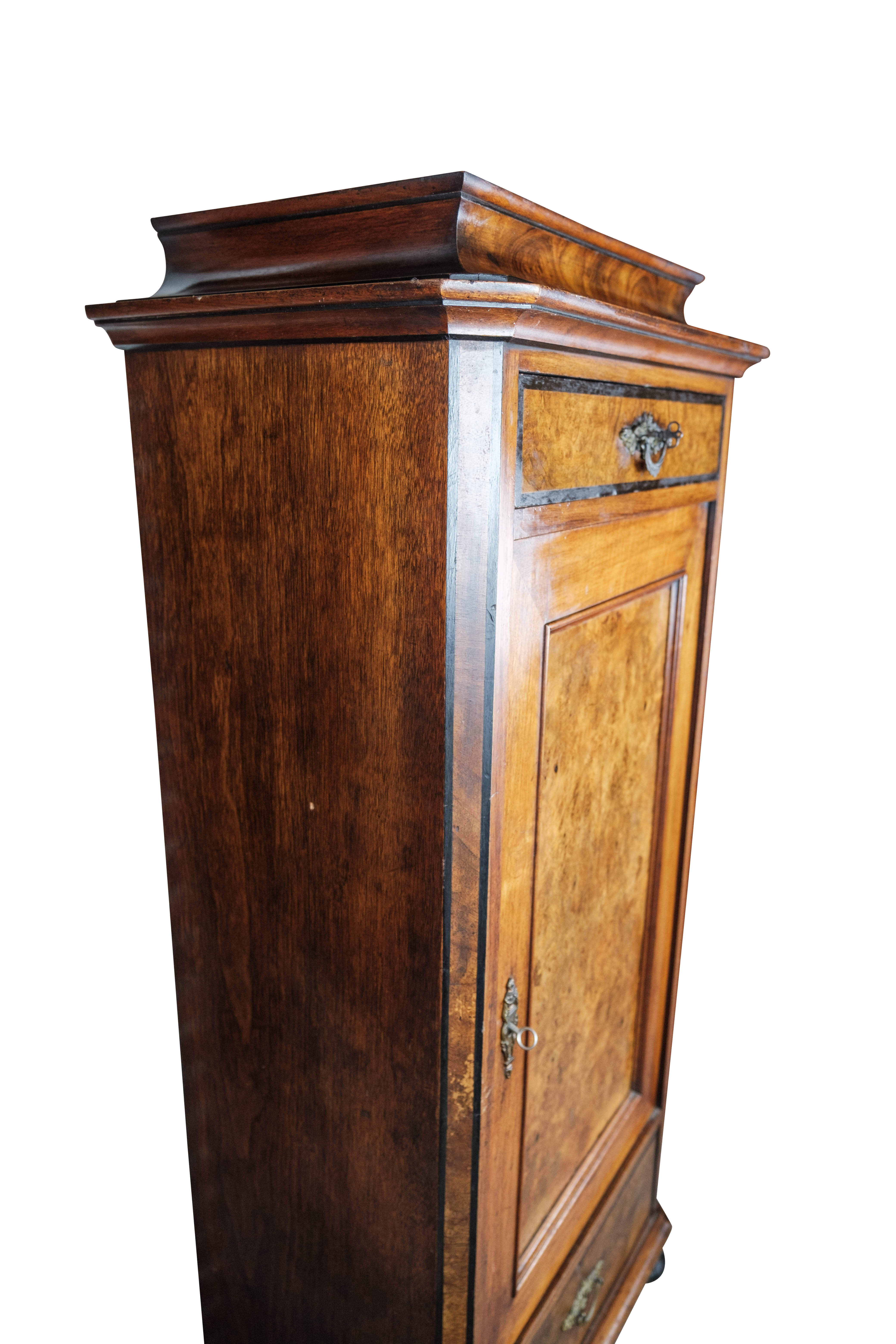 Cabinet of walnut, 1850s