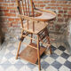 Ancienne chaise haute modulable pour bébé en bois