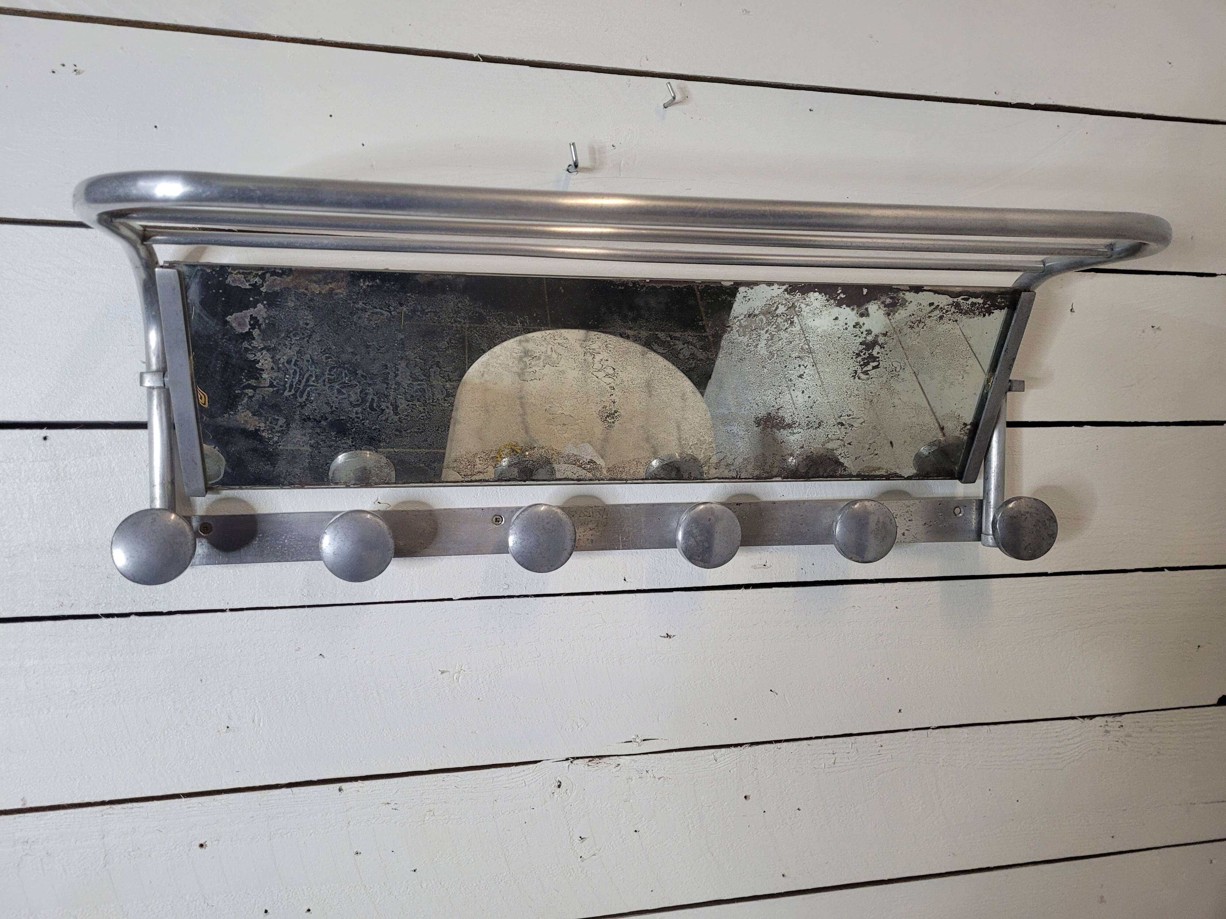 Swivel aluminum mirror wall coat rack from the 60s